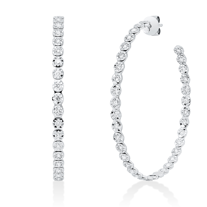 Creolen    aus 750/-18 Karat Weißgold mit 70 Diamanten 2 ct