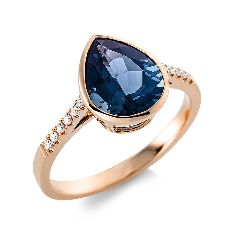 Ring mit Topas  aus 750/-18 Karat Rotgold mit 12 Diamanten 0